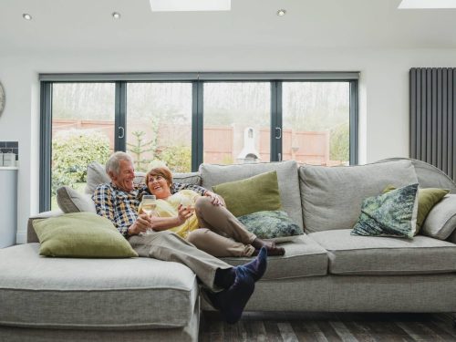 Senior couple relaxing on a couch