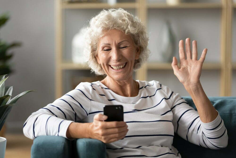 Senior woman on a video call with family