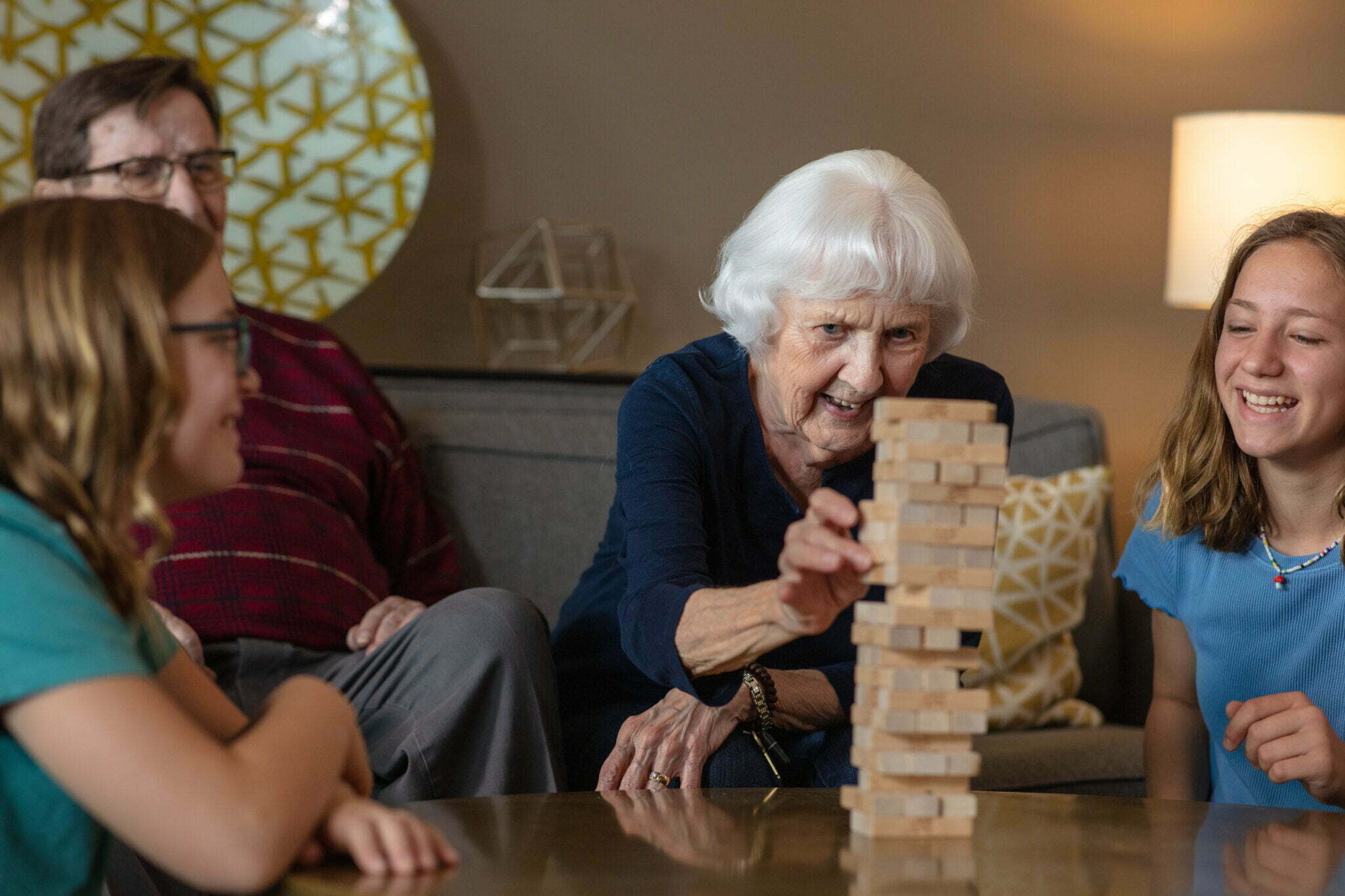 Senior living residents playing Jenga